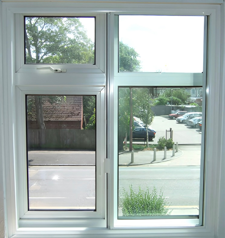 Three-panel horizontal sliding screens installed in a kitchen